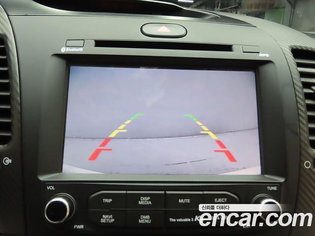 Kia K3 2013 — photo 17