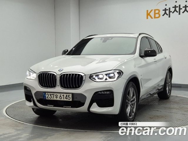 BMW X4 2021 — photo 1