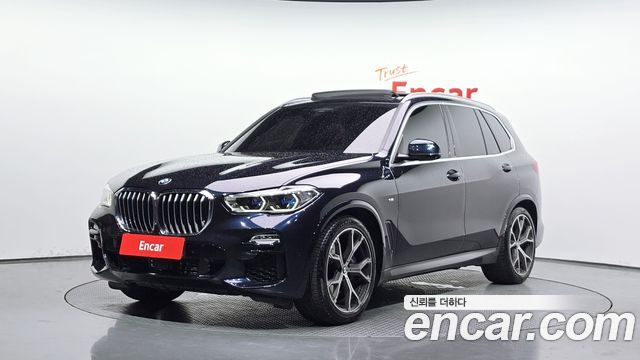 BMW X5 2021 — photo 1