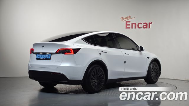 Tesla Model Y 2022 — photo 2