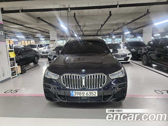 BMW X5 2022 — photo 1