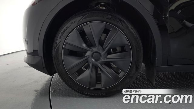 Tesla Model Y 2024 — photo 5