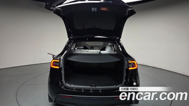 Tesla Model Y 2024 — photo 20