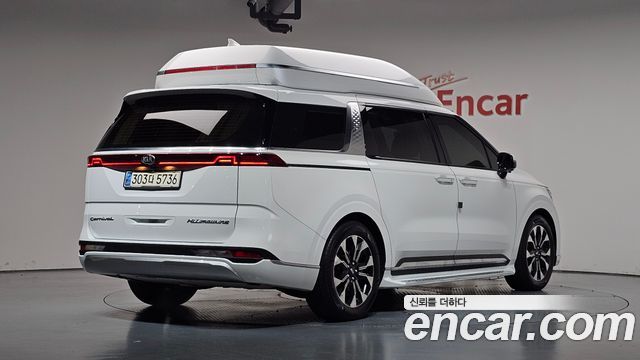 Kia Canival 2021 — photo 2