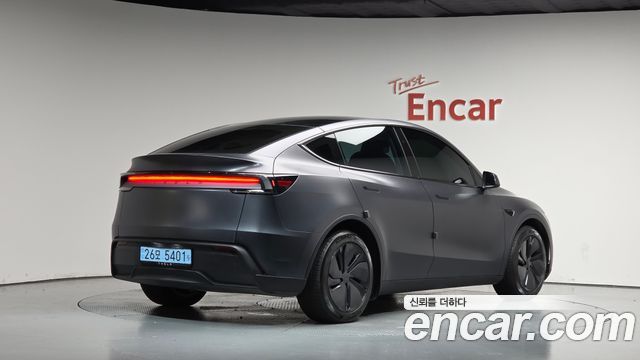 Tesla Model Y 2025 — photo 2