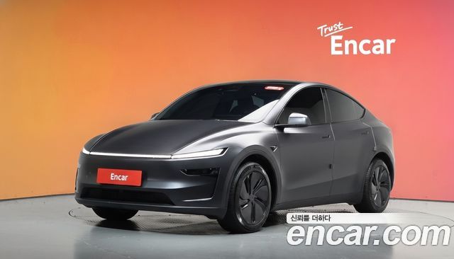 Tesla Model Y 2025 — photo 1