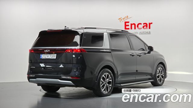 Kia Canival 2023 — photo 2