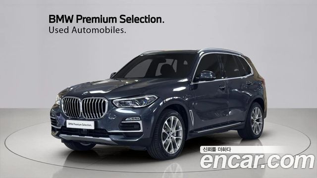 BMW X5 2021 — photo 1