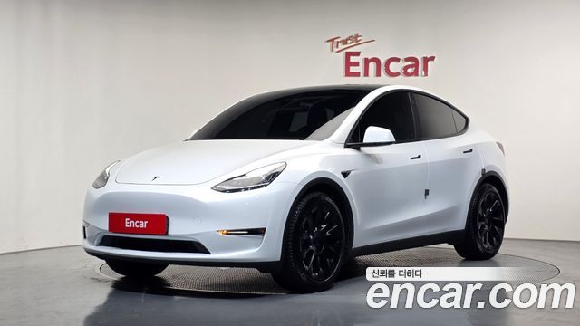 Tesla Model Y 2022 — photo 1