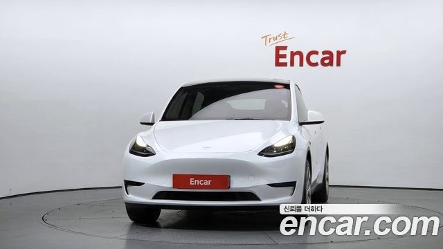 Tesla Model Y 2024 — photo 3