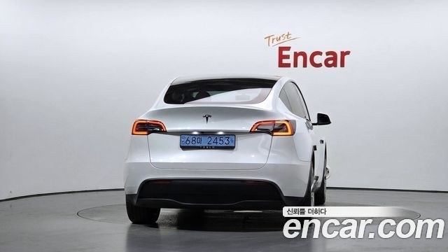 Tesla Model Y 2024 — photo 4