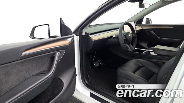 Tesla Model Y 2024 — photo 13