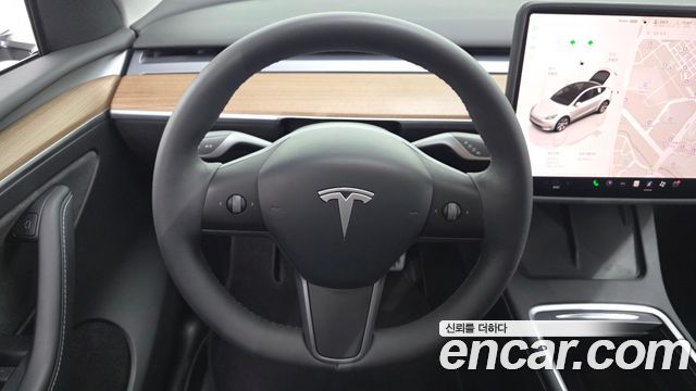 Tesla Model Y 2024 — photo 20