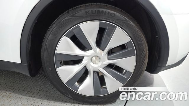 Tesla Model Y 2024 — photo 7