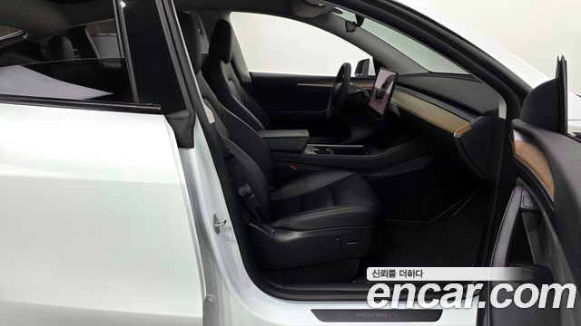 Tesla Model Y 2024 — photo 16