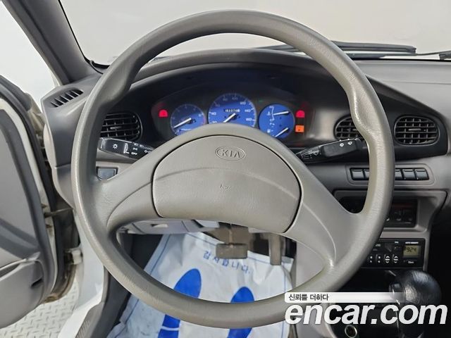 Kia Avella 1997 — photo 9
