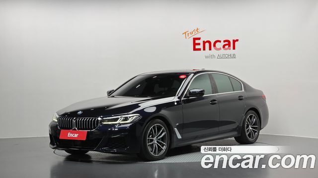 BMW 5-Series 2023 — photo 1