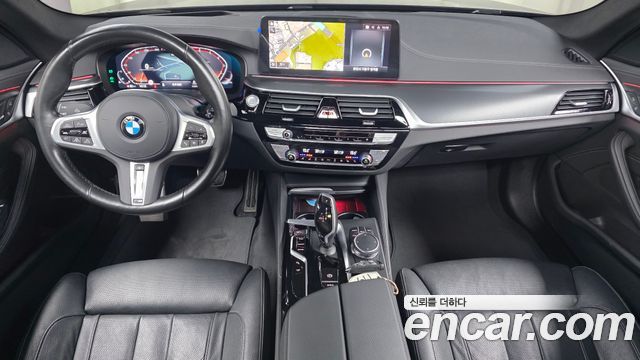 BMW 5-Series 2023 — photo 10