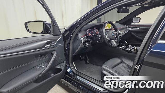 BMW 5-Series 2023 — photo 13