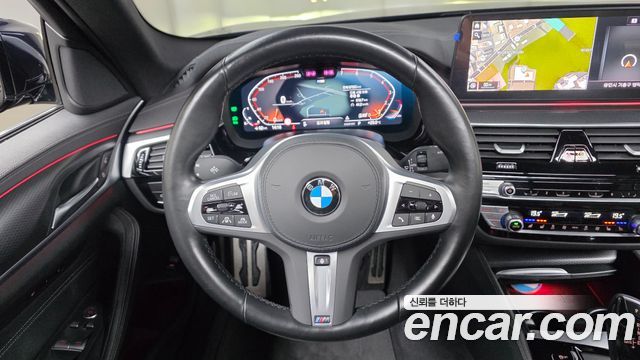 BMW 5-Series 2023 — photo 20