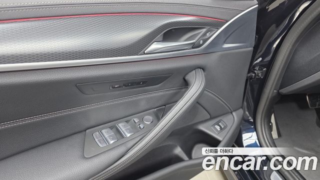 BMW 5-Series 2023 — photo 24