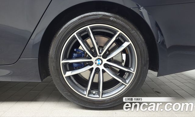 BMW 5-Series 2023 — photo 7