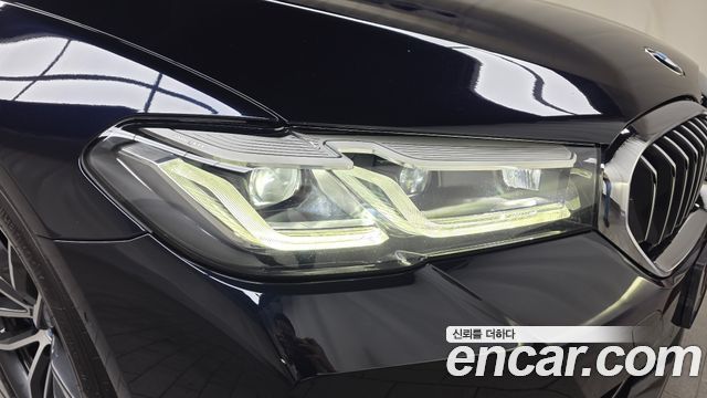 BMW 5-Series 2023 — photo 8