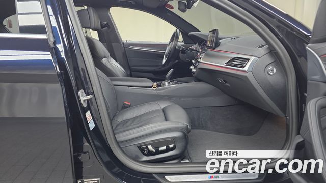 BMW 5-Series 2023 — photo 16