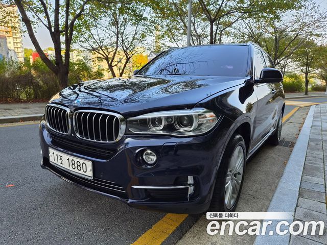 BMW X5 2015 — photo 1