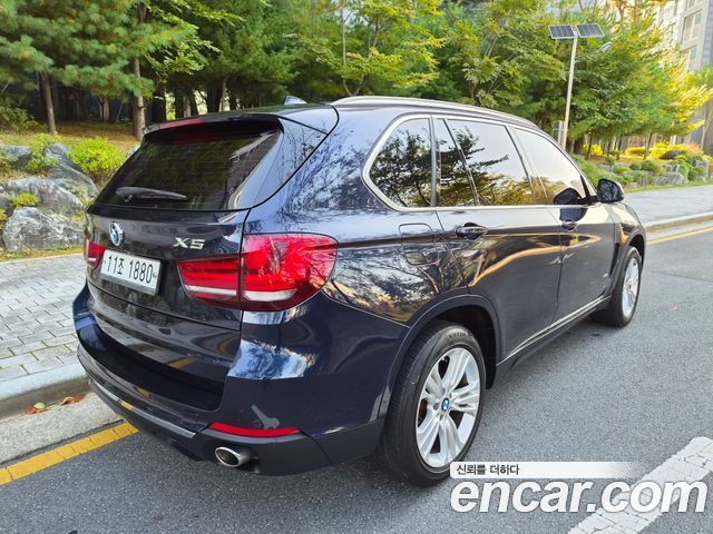 BMW X5 2015 — photo 2