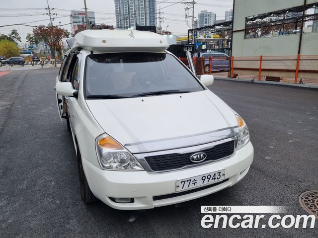Kia Canival 2009 — photo 1