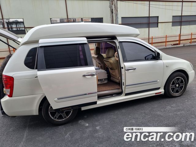 Kia Canival 2009 — photo 2