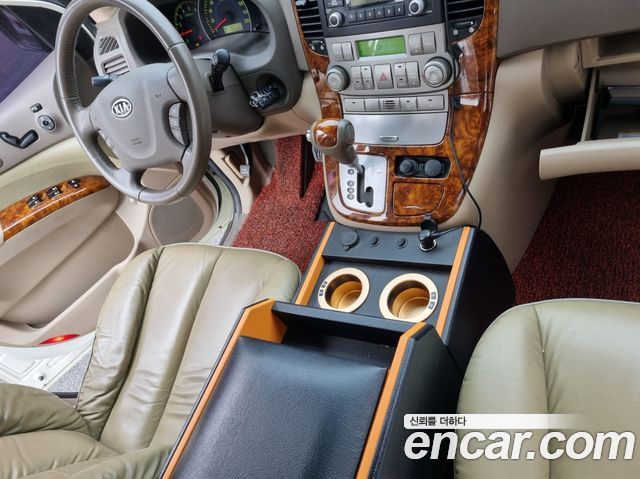 Kia Canival 2009 — photo 8