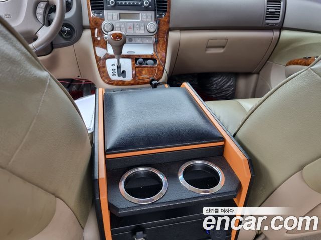 Kia Canival 2009 — photo 13