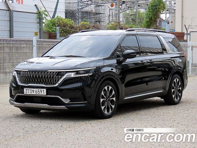 Kia Canival 2023 — photo 2