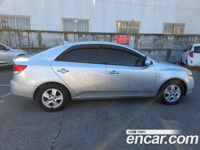 Kia Porte 2012 — photo 8