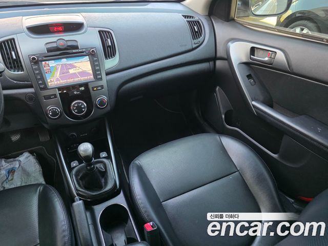 Kia Porte 2012 — photo 11
