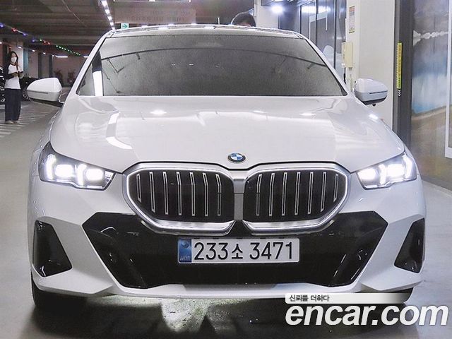 BMW 5-Series 2024 — photo 2