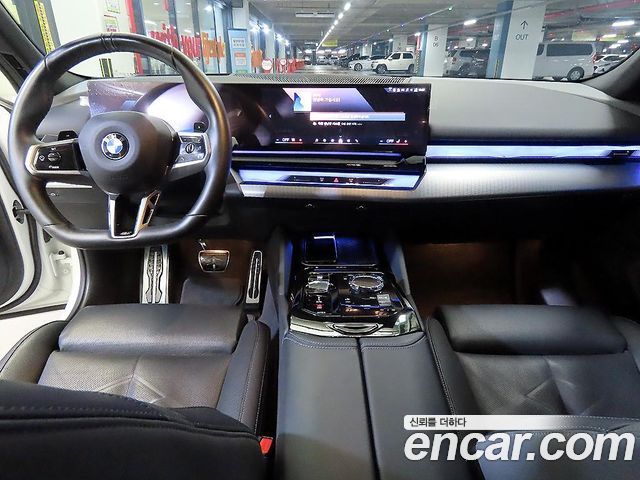 BMW 5-Series 2024 — photo 10