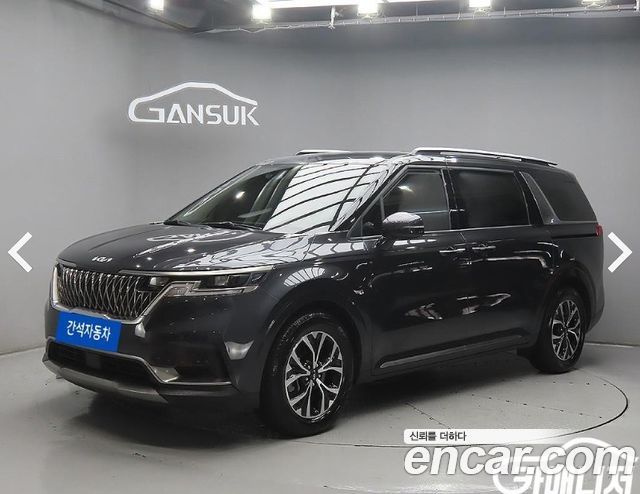 Kia Canival 2023 — photo 1