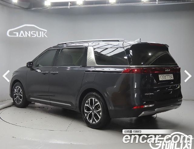 Kia Canival 2023 — photo 2