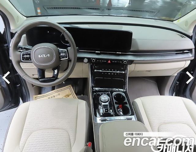 Kia Canival 2023 — photo 11