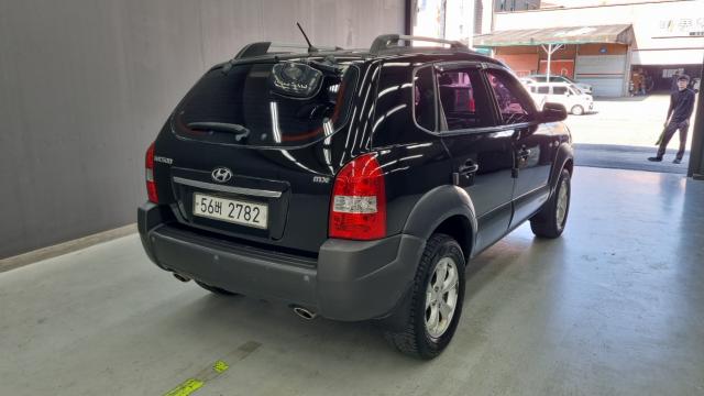 Hyundai Tucson 2009 — photo 2