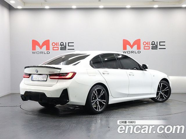 BMW 3-Series 2023 — photo 2