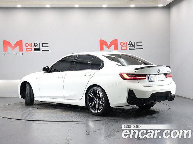 BMW 3-Series 2023 — photo 4