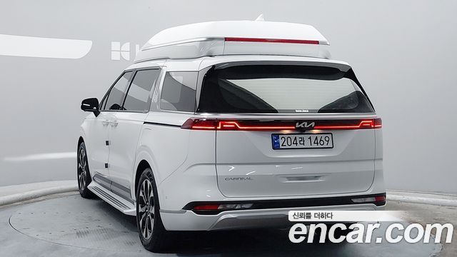 Kia Canival 2023 — photo 2