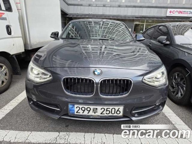 BMW 1-Series 2015 — photo 1