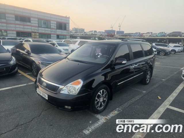 Kia Canival 2013 — photo 1