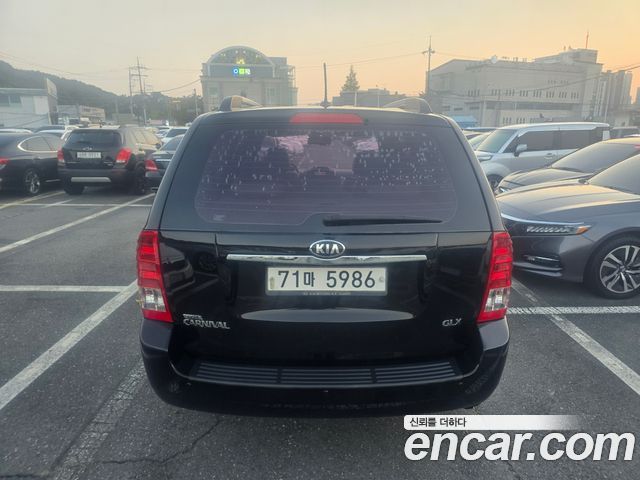 Kia Canival 2013 — photo 4