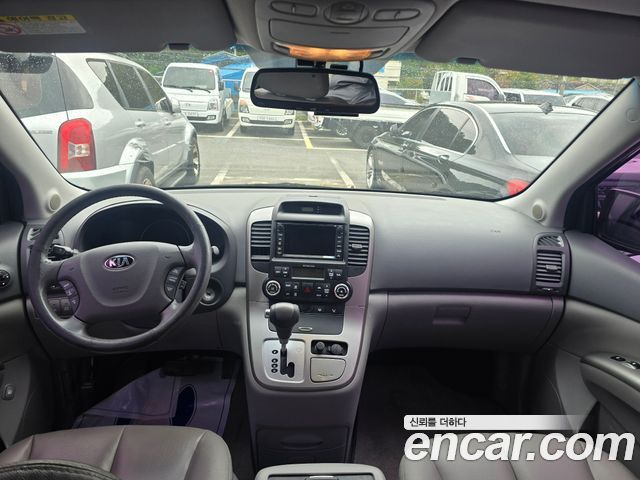 Kia Canival 2013 — photo 7